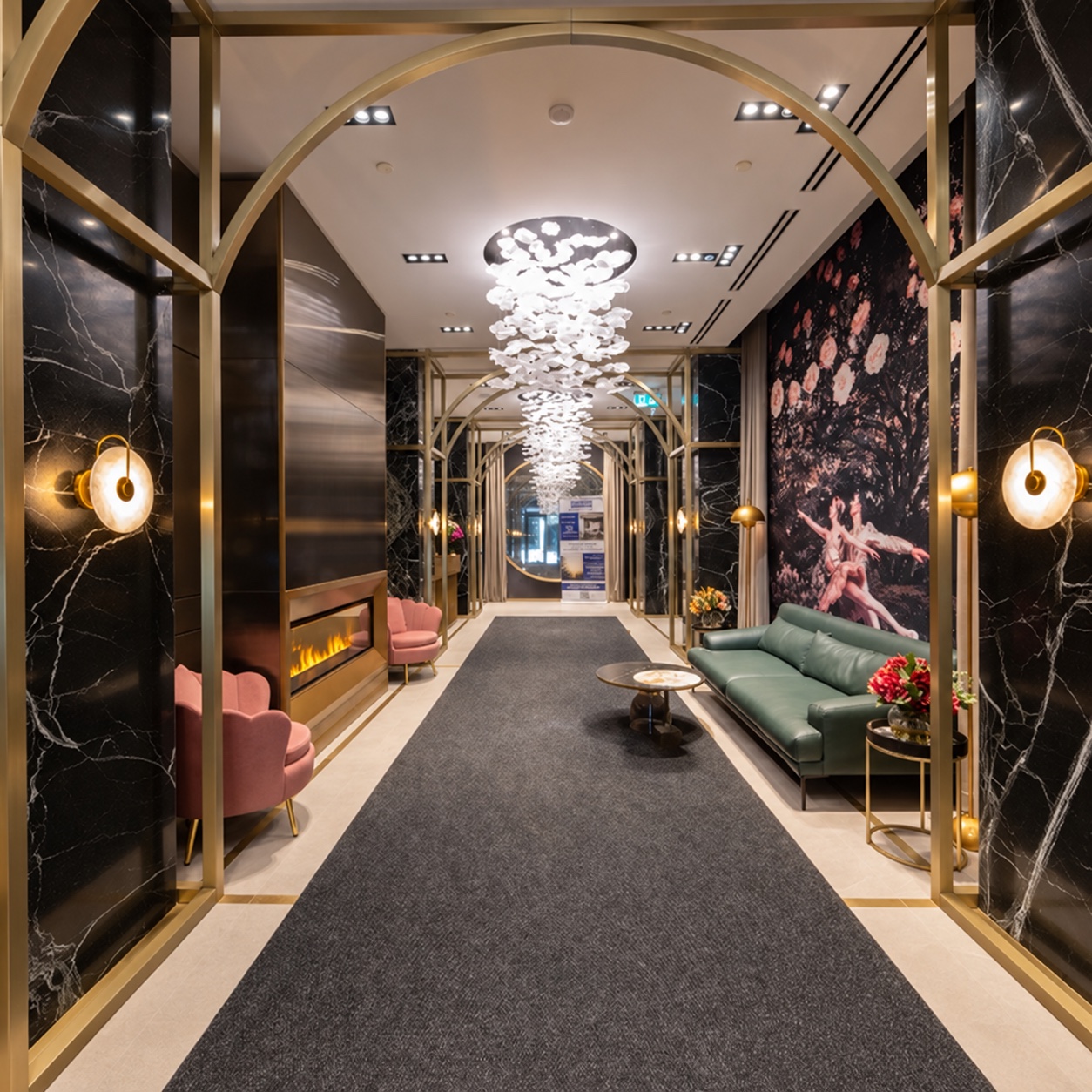 MENKES amenity corridor with seating, decorative lighting and arched detailing